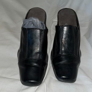 Black mule dress shoe with heel, very comfortable and stylish. Gently used